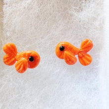 Load image into Gallery viewer, Two orange fish earrings made of polymer clay