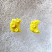 Load image into Gallery viewer, One pair of yellow crescent moon stud earrings with craters