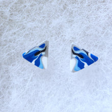 Load image into Gallery viewer, A pair of blue, silver, and white triangular earrings