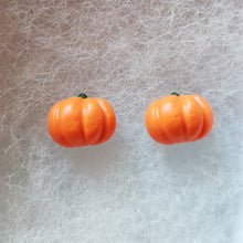 Load image into Gallery viewer, Close up view of pair of flat backed, side view, orange pumpkin earrings.