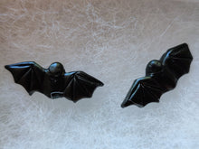 Load image into Gallery viewer, A close up detail picture of one pair of flat backed bat earrings with relief sculpted detail.
